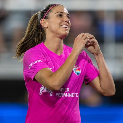 Alex Morgan #13 of San Diego Wave FC interacts with Washington Spirit fans during a game between San Diego Wave FC and Washington Spirit at Audi Field on June 15, 2024 in Washington, DC.