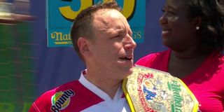 Joey Chestnut holding the Nathan's hot dog eating title ESPN