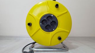 Use an old power cord reel