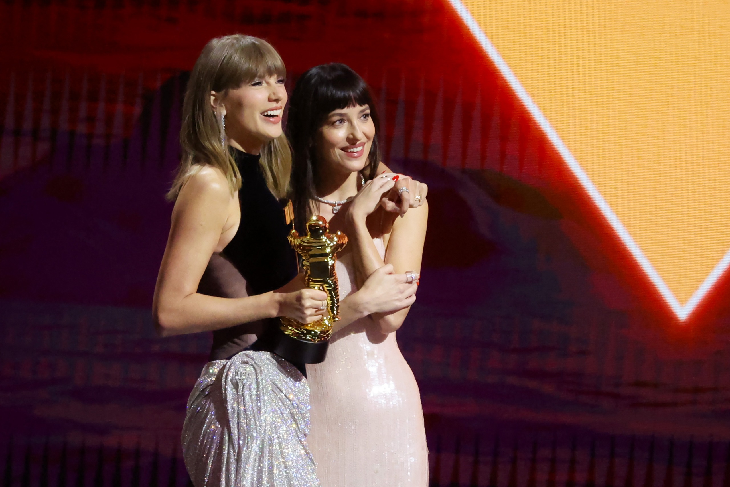 Dakota Johnson and Taylor Swift onstage during the 2026 MTV Video Music Awards (VMAs) at Peacock Theater on September 27, 2026 in Los Angeles, California.
