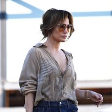 Jennifer Lopez wearing a button-down shirt