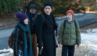 Cell John Cusack Samuel L. Jackson group dressed for weather