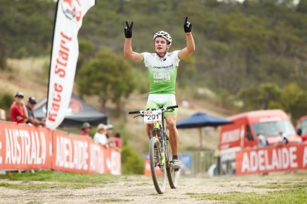 Ecstatic winner Ryan Standish takes out the U19 Mens XC