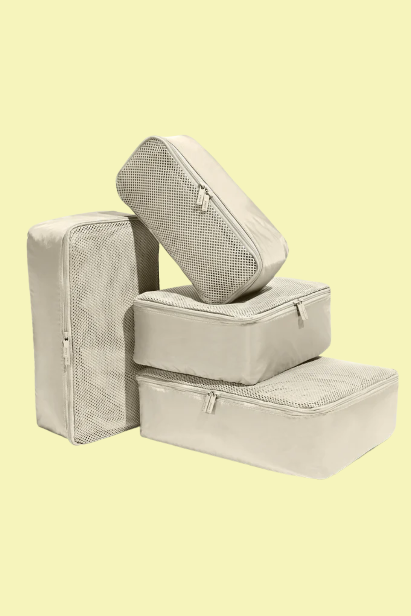 A set of off-white packing cubes