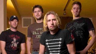 Nickelback posing for a photograph in the recording studio in 2005