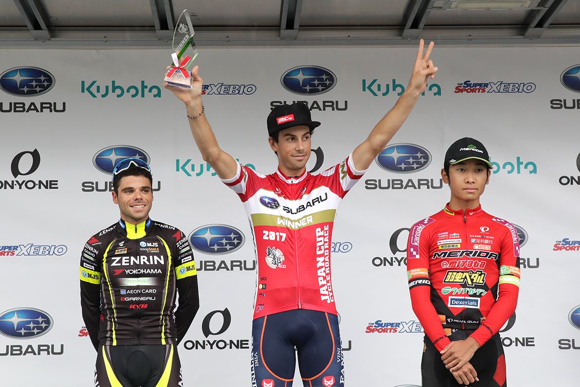 Marco Canola atop the podium
