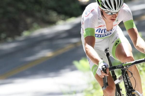 Frenchman Alexandre Geniez rides alone and off the front on Bear Creek Road.