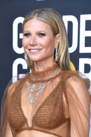 Gwyneth Paltrow smiles on the red carpet.