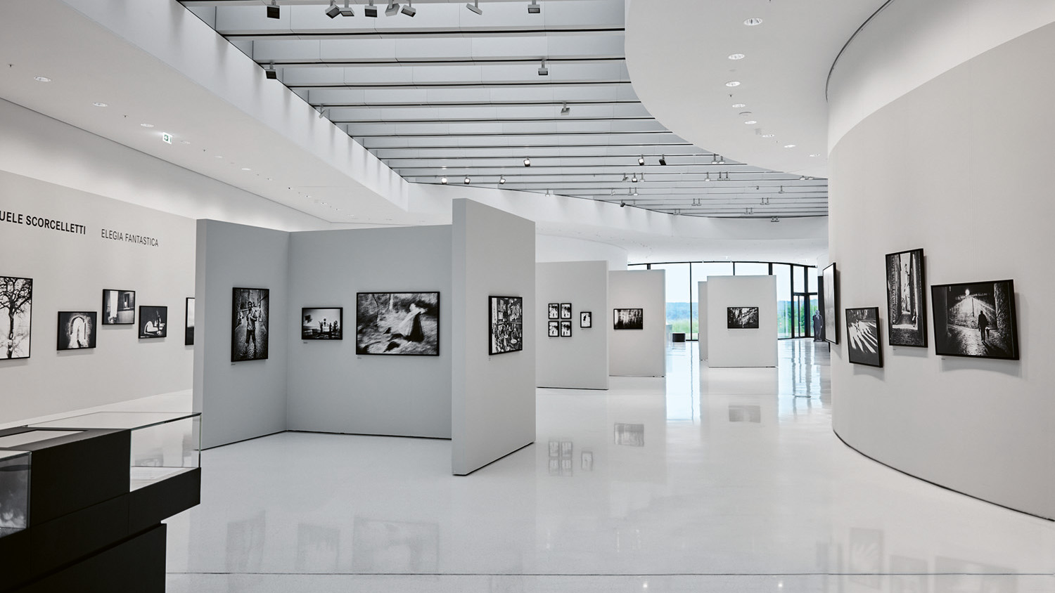 A photo gallery. There are photos displayed on the wall.