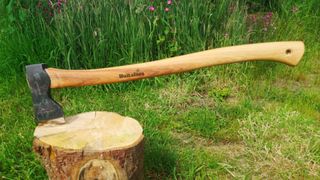 Hults Bruk Akka camping axe stuck in tree stump