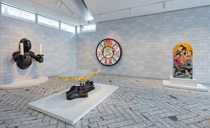 Image of the new exhibition at New Yorks museum of Art and Design showing four exhibits