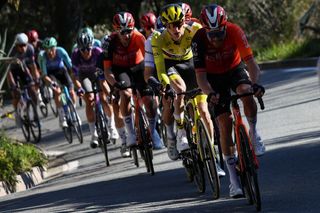 Team Visma-Lease a Bike's US rider Matteo Jorgenson wearing the overall leader's yellow jersey cycles with the pack of riders (peloton) during the 8th and final stage of the Paris-Nice cycling race, 119,9 km between Nice and Nice, on March 16, 2025. (Photo by Anne-Christine POUJOULAT / AFP)