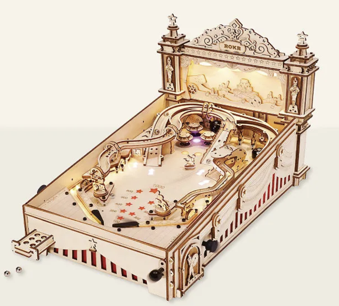 A wooden tabletop pinball machine