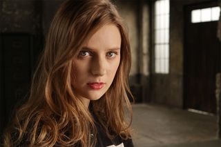 Head and shoulders portrait of brown-haired woman, taken on Canon PowerShot G1 X Mark III