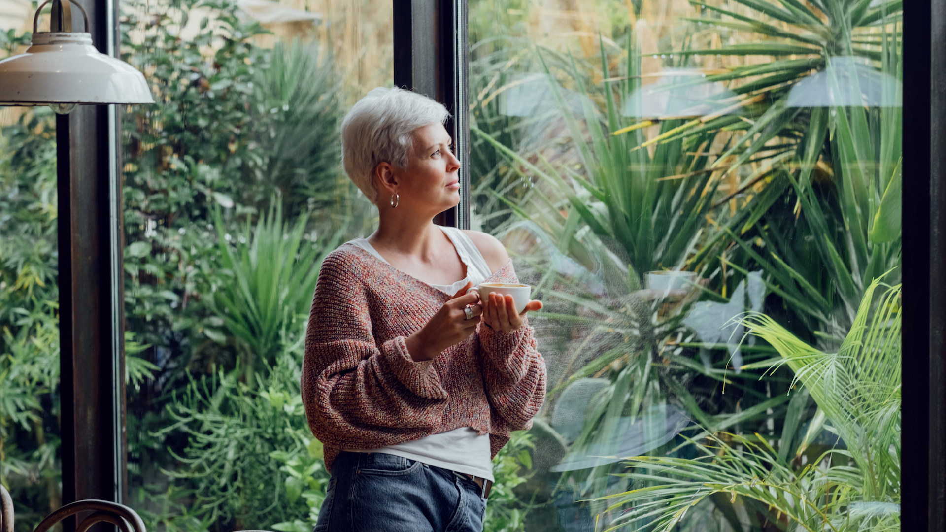 Woman looking out window