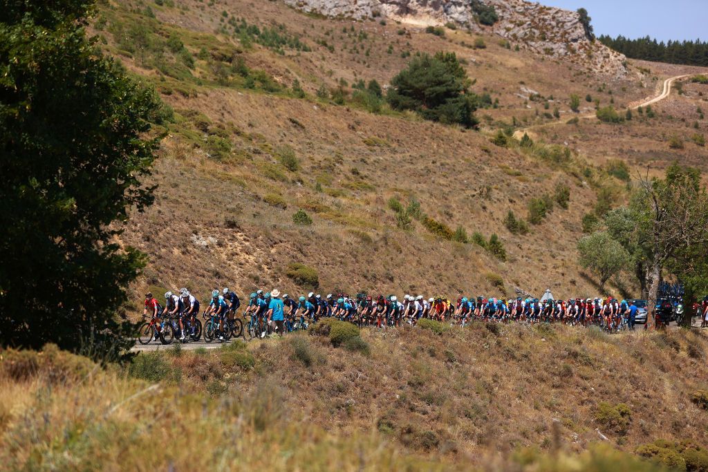 BURGOS SPAIN AUGUST 02 A general view of the peloton passing through a landscape during the 44th Vuelta a Burgos 2022 Stage 1 a 157km stage from Catedral de Burgos to Mirador del Castillo Burgos VueltaBurgos on August 02 2022 in Burgos Spain Photo by Gonzalo Arroyo MorenoGetty Images