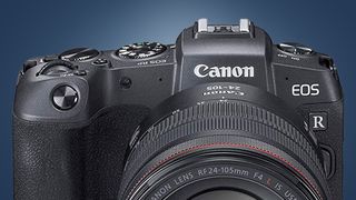 The Canon EOS RP on a blue background