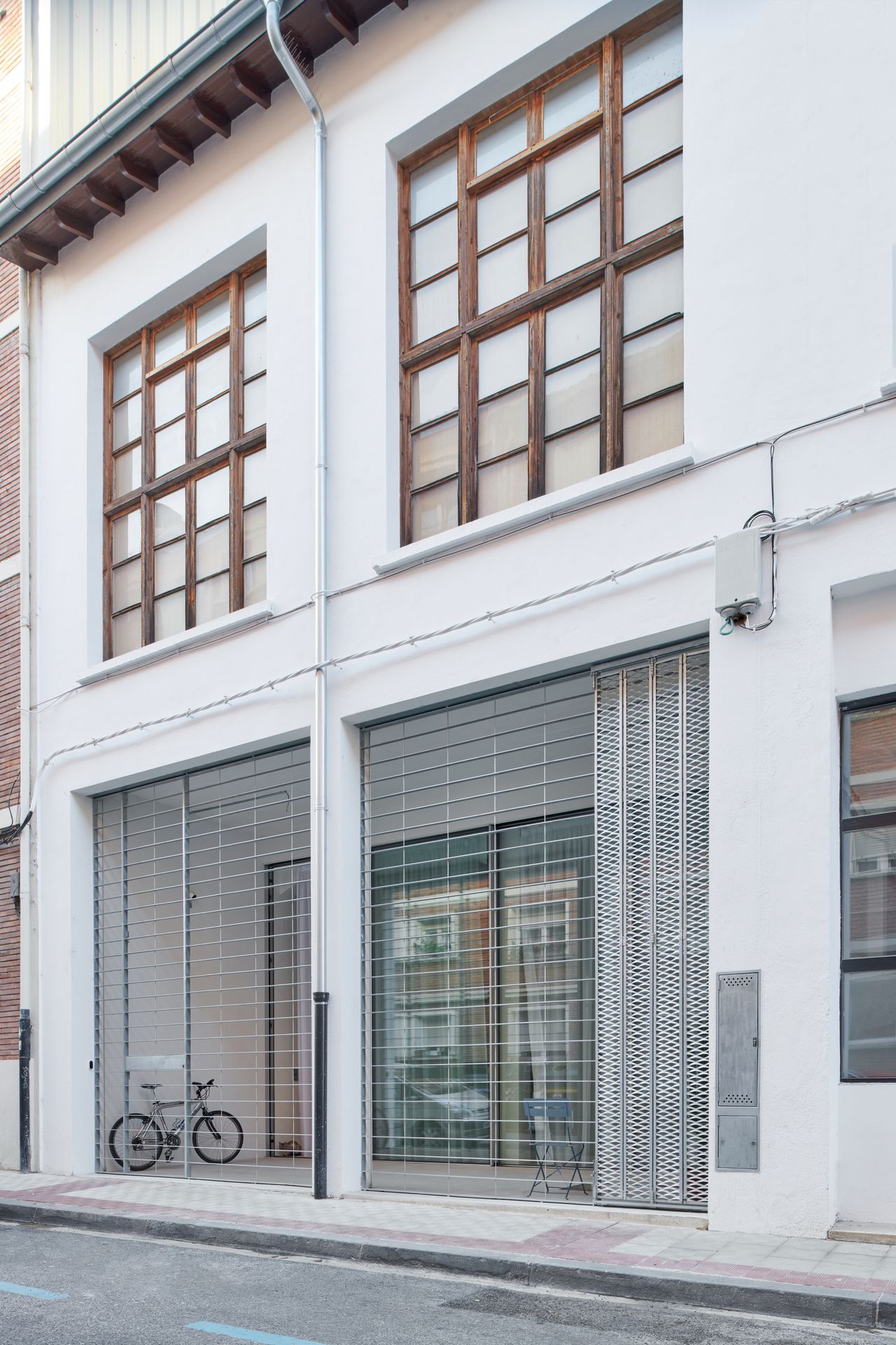 An industrial space becomes a serene private apartment | Wallpaper* - Industrial Apartment Complex With Shared Outdoor Lounge