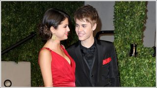 Singer/actress Selena Gomez and singerJustin Bieber arrive at the Vanity Fair Oscar party hosted by Graydon Carter held at Sunset Tower on February 27, 2011 in West Hollywood, California.