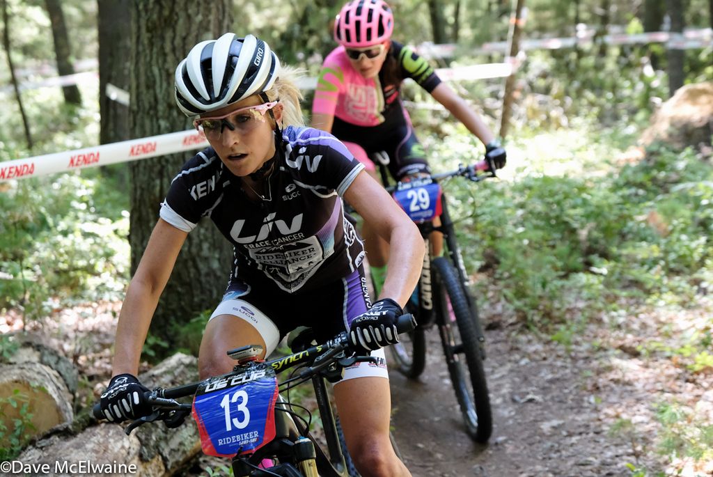 Makaela Kofmann (Ridebiker Alliance) leading Emily Shields through some twisty singletrack