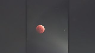 Blood moon during lunar eclipse, as seen from Mexico.