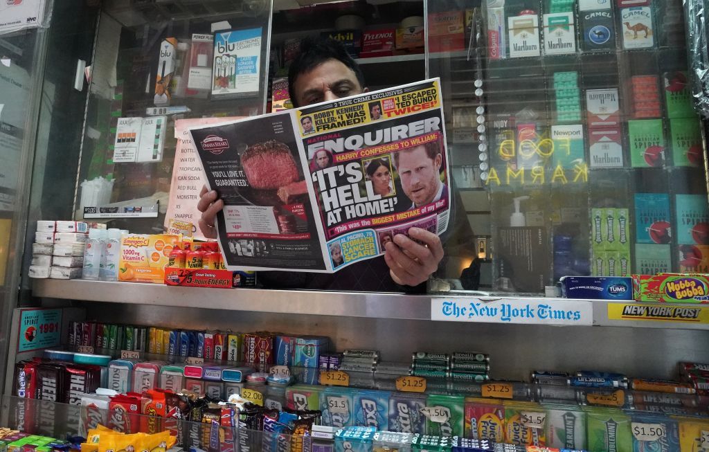 A man reads the &amp;quot;National Enquirer.&amp;quot;