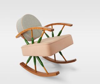 Rocking chair with pink sear and round grey backrest by Mentalla Said and Jumana Taha