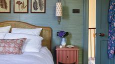 Blue bedroom with textured wallpaper