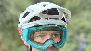 Alpinestars Vector Tech Solid helmet being worn by a model with goggles