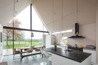 open plan extension with track lighting vaulted ceiling