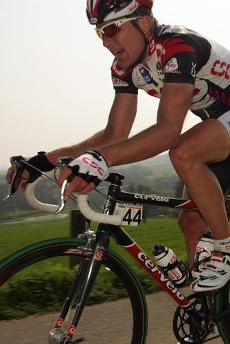 Lars Michaelsen (CSC) catches back up after having a mechanical on an earlier climb.