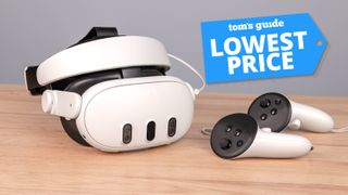 Kiwi Design H4 Boost Battery Strap attached to Meta Quest 3 with controllers on table with Tom's Guide Lowest Price badge