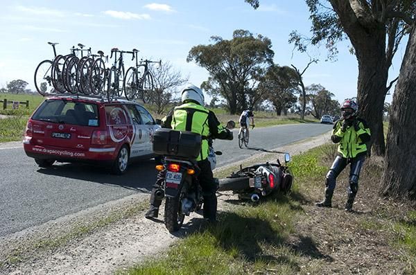 A motor-bike scout came down beside the peloton in the concluding kilometres of the stage causing havoc as the pace increased
