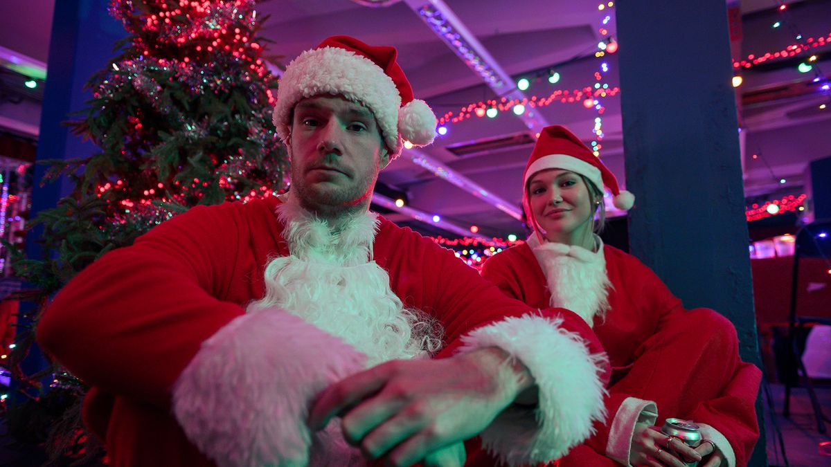 Connor Swindells as Nick and Olivia Holt as Sophia in Jingle Bell Heist.