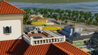 Cities: Skylines 2 Beach Properties screenshot - balcony with beach chairs and umbrellas overlooking a street running beside a palm tree-lined coast
