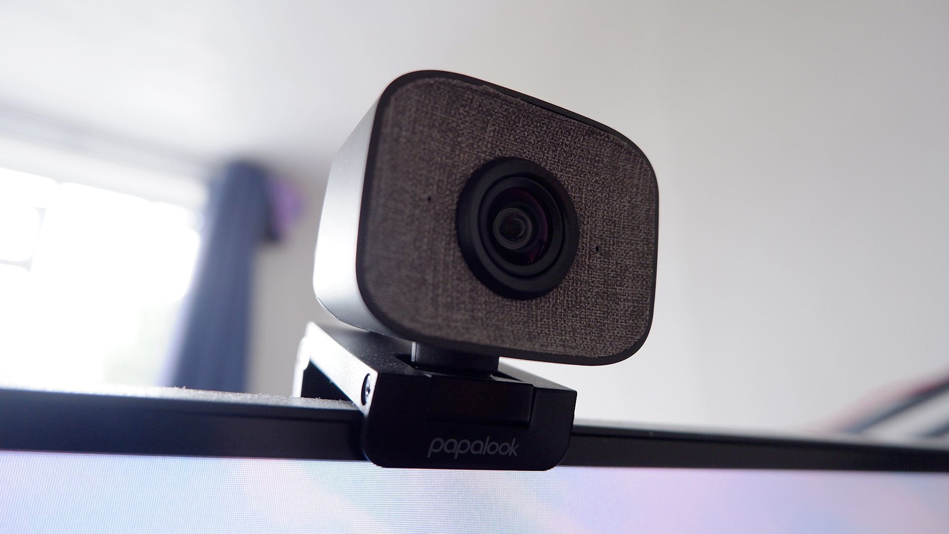 Papalook PA930 webcam on top of a computer monitor