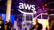 Attendees walk through an expo hall during AWS re:Invent 2022, a conference hosted by Amazon Web Services, at The Venetian Las Vegas on November 29, 2022 in Las Vegas, Nevada.