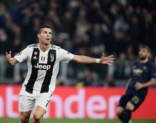 Cristiano Ronaldo celebrates after scoring for Juventus against former club Manchester United in 2018.