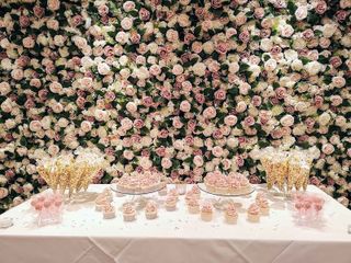 pink rose flower wall behind sweets