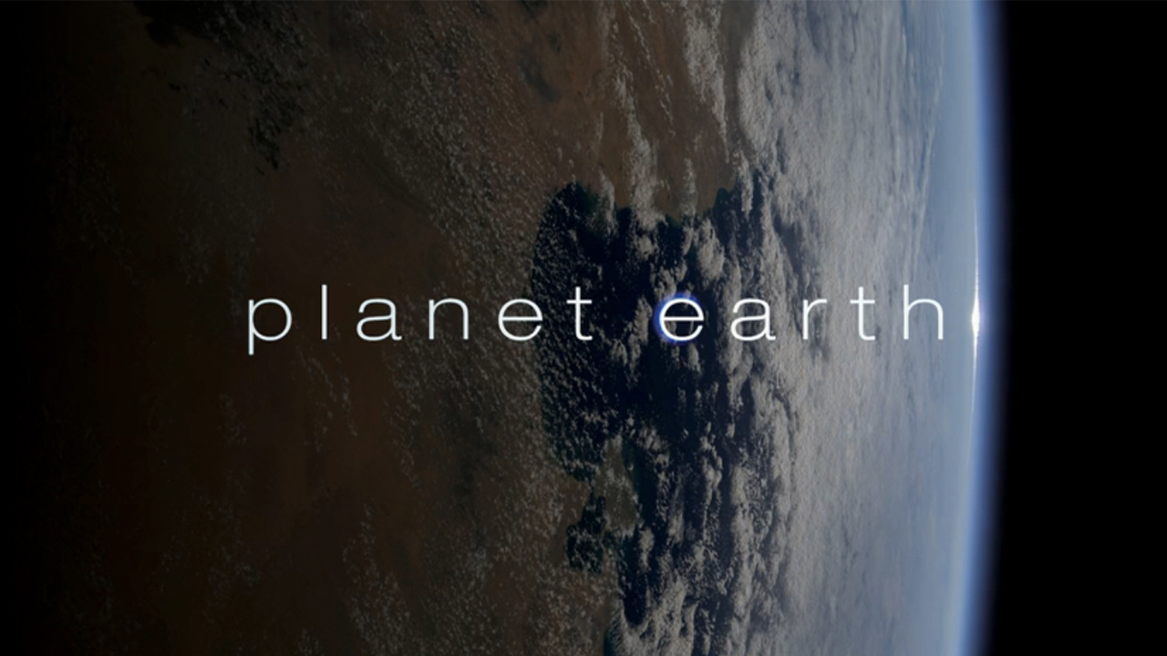 The opening title card reading "Planet Earth" with the plane behind it. 