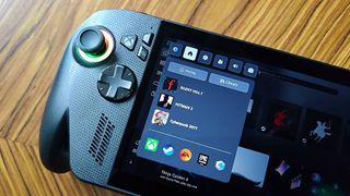 Close up of Xbox Ally X handheld with game bar menu on screen.