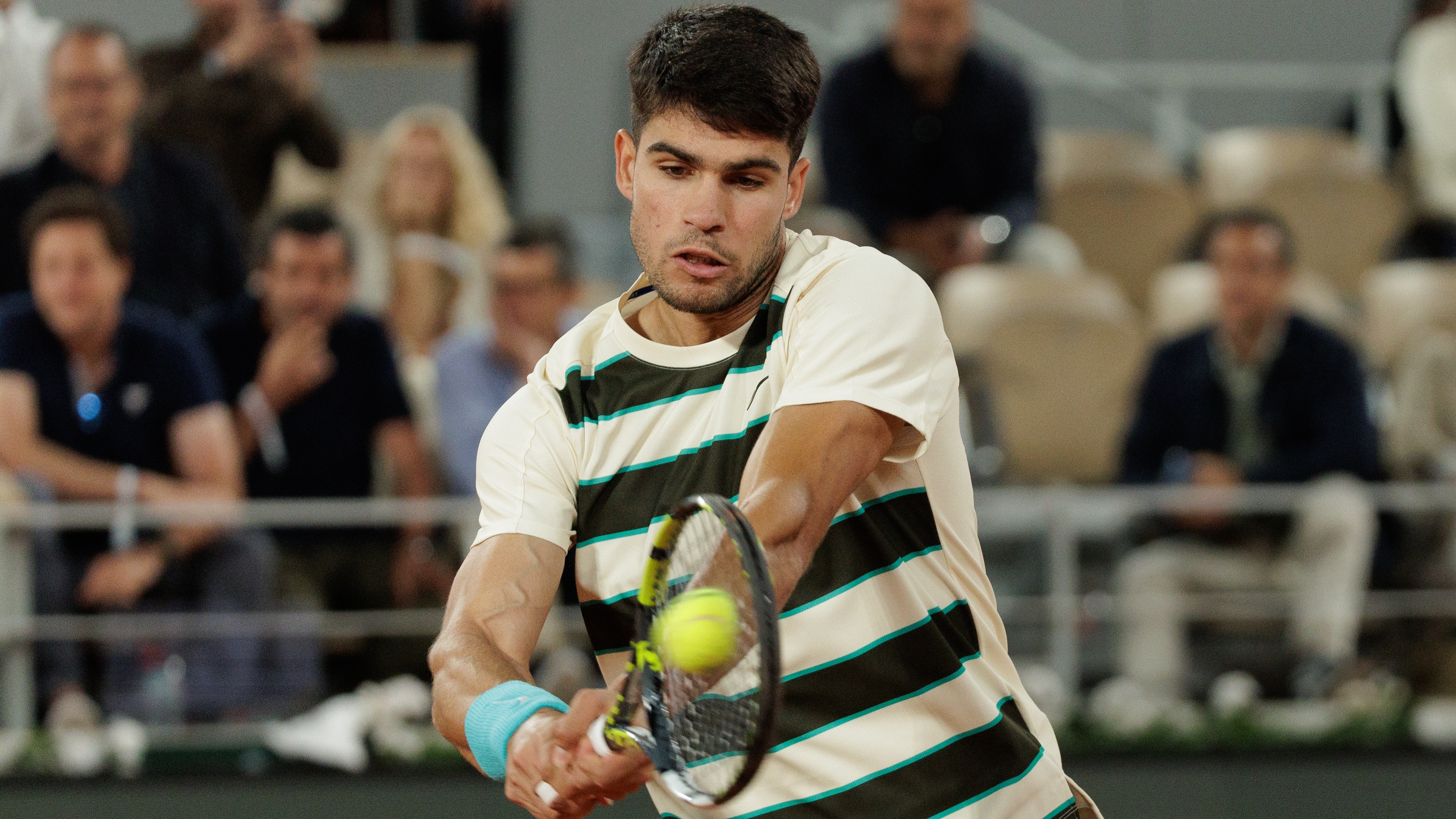 Paris, France - June 3: Carlos Alcaraz of Spain plays a backhand against Tommy Paul of United States during the Men's Singles Quarter Final match on Day Ten of the 2025 French Open at Roland Garros on June 03, 2025 in Paris, France. (Photo by Tnani Badreddine/DeFodi Images/DeFodi via Getty Images)
