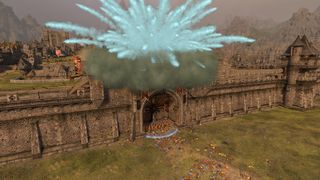 Total War: Warhammer 3 sieges - Magic hitting the top of a gate