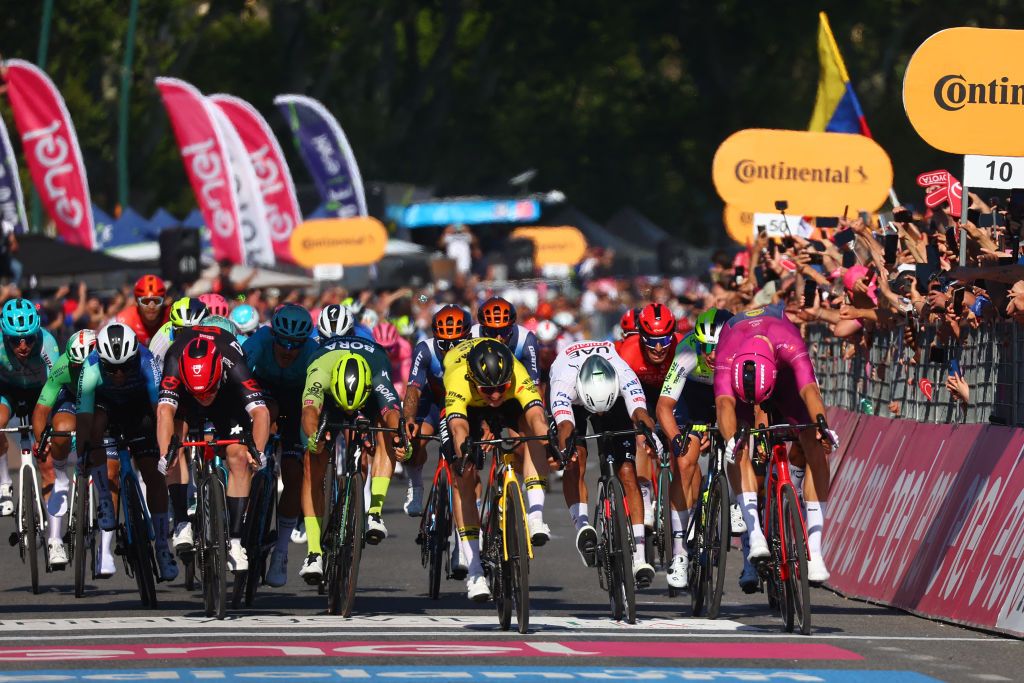 Bike throw for Olav Kooij (Visma-Lease a Bike) to win stage 9 in Naples