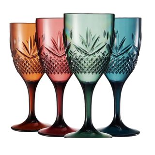 Four colored wine glasses in jewel tones