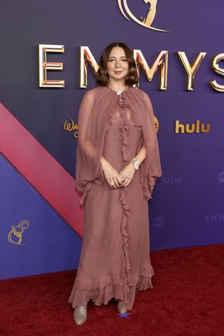 Maya Rudolph wears a ruffle dress from Chloe's fall/winter 2024 show.