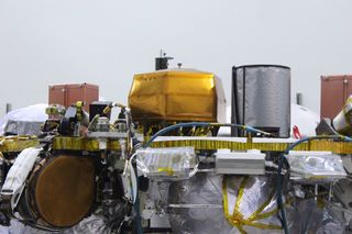 A close-up view of InSight, topped with the Seismic Experiment for Interior Structure (SEIS), a seismometer provided by France's Centre National d'Études Spatiales (CNES).