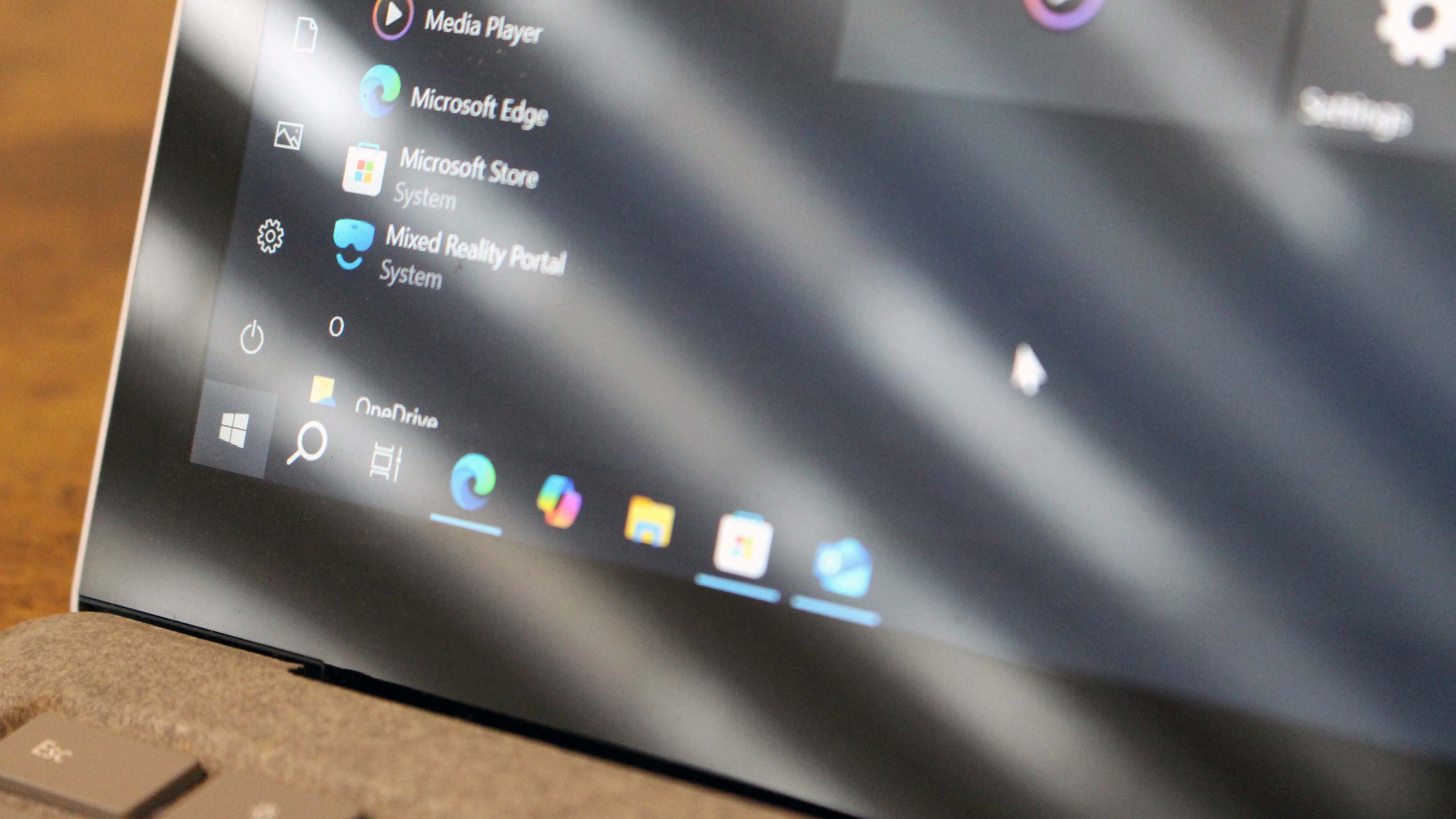 Windows 10 running on a laptop with desktop elements displayed on its screen