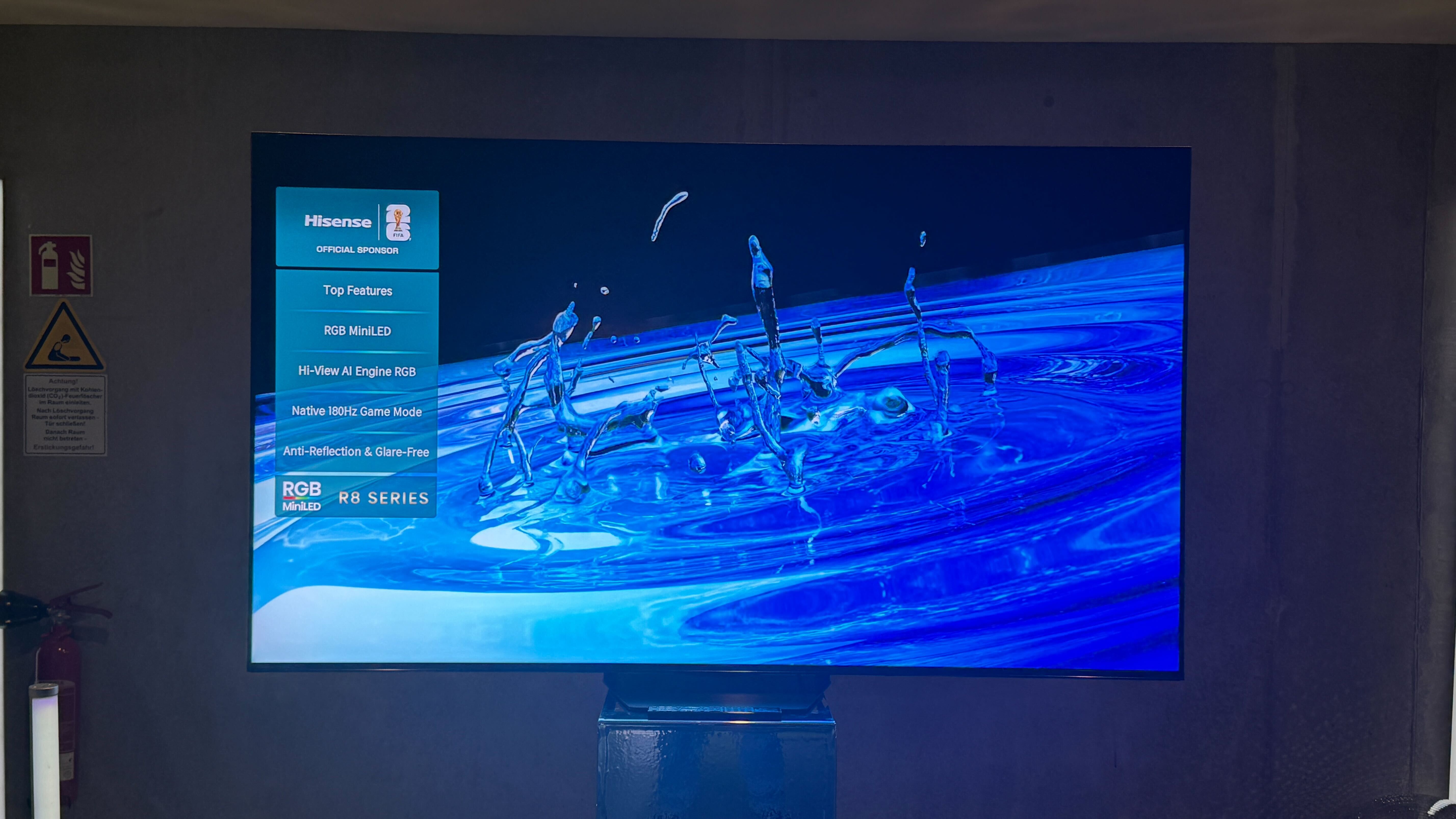 Hisense UR8 on a stand at a press event