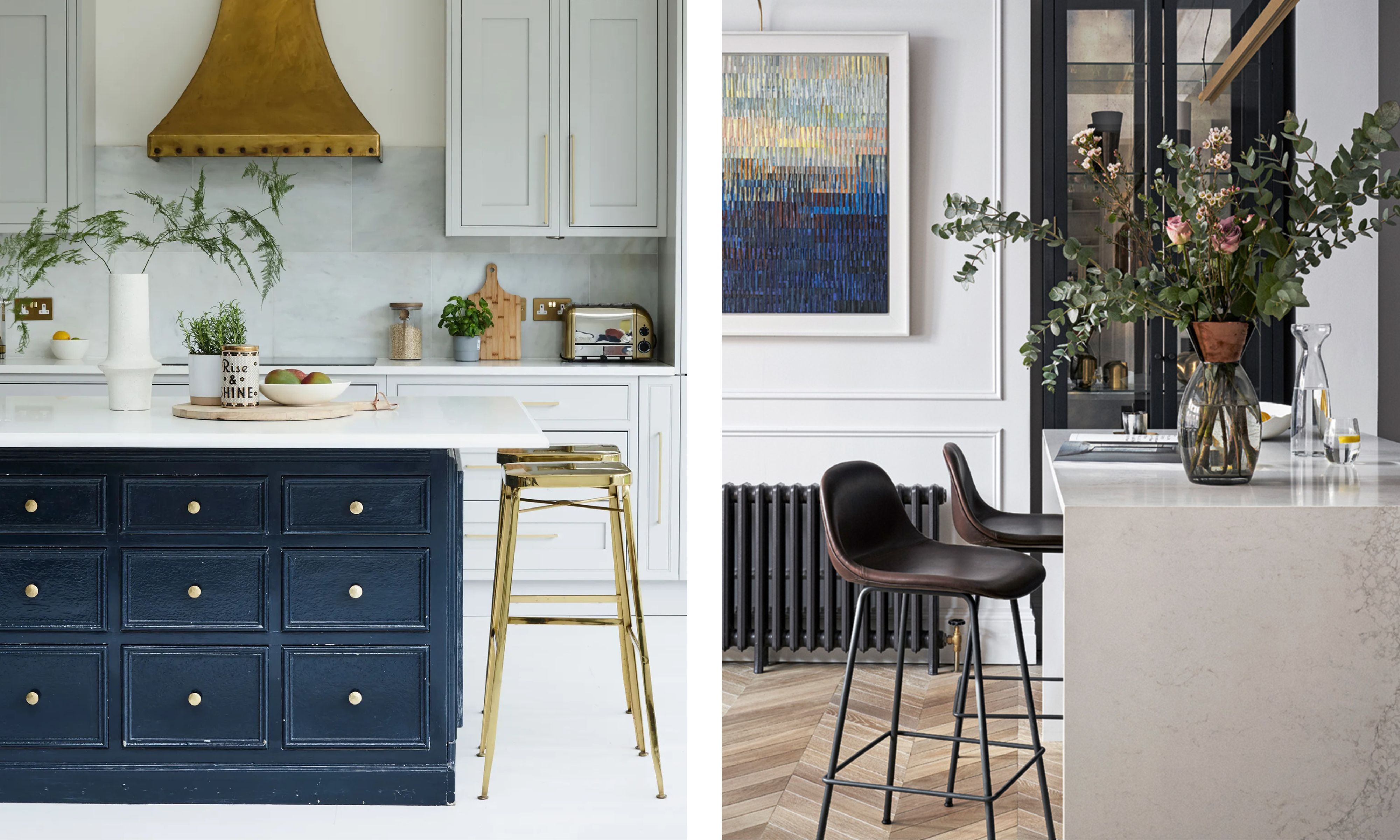 A split image showing two different modern kitchen scenes featuring islands and bar seating. On the left, a light grey kitchen has a dark navy island with gold drawer pulls and a white countertop. A brass-colored vent hood hangs above. A tall, gold-framed bar stool is tucked under the island. On the right, two black leather bar stools with black frames are positioned at a white countertop island. The background features white wainscoting, a black radiator, and a large, colorful abstract painting with blue and yellow tones.